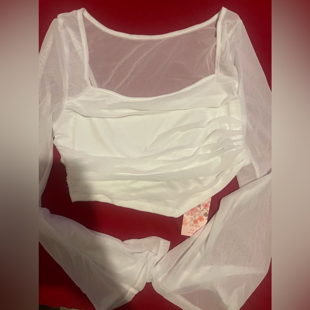 I’m selling a cute white top from SHEIN :)
